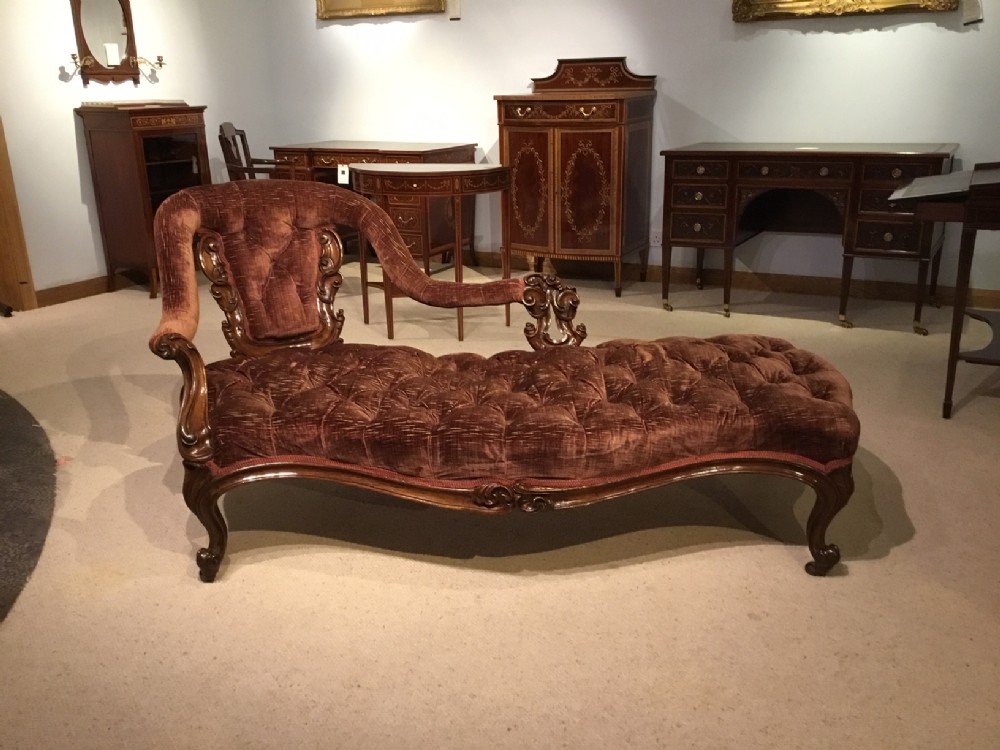 A carved walnut Victorian Period antique chaise longue