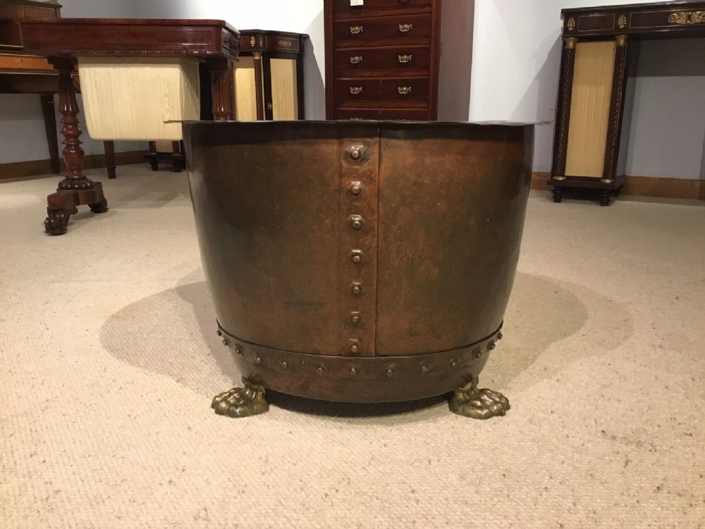 A Good 19th Century patinated copper riveted log bin.