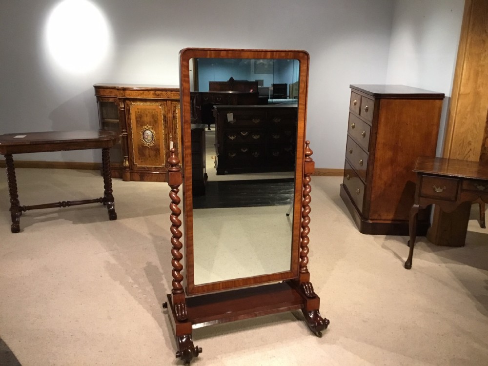 A mahogany Victorian Period cheval dressing mirror