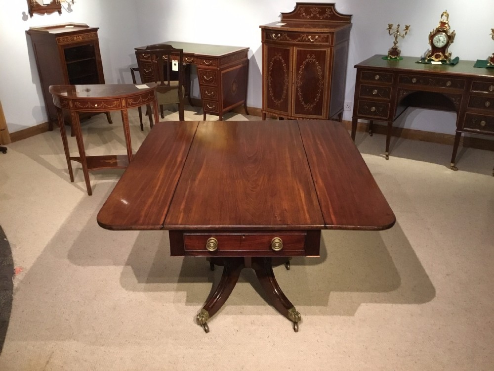 A Regency Period Cuban Mahogany antique Pembroke Table.