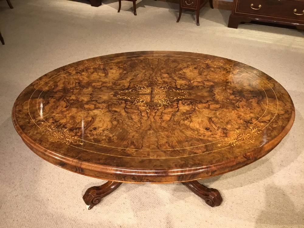 A superb burr walnut marquetry inlaid Victorian Period coffee table