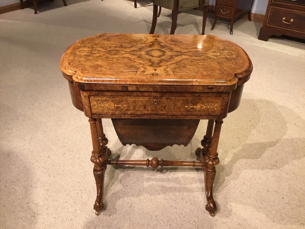 A burr walnut Victorian Period antique games/work table