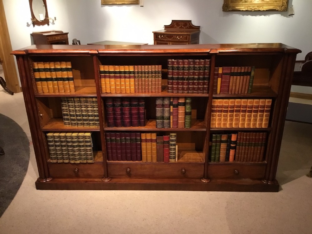 A good figured mahogany Early Victorian Period antique open bookcase
