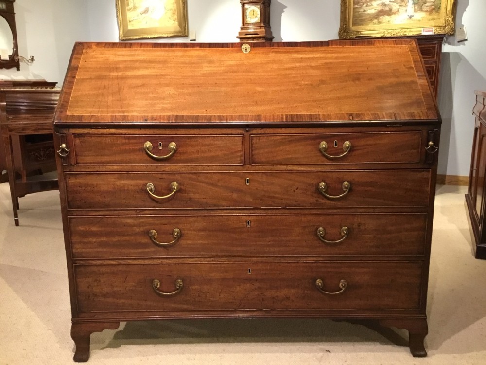 A good mahogany George III Period antique bureau