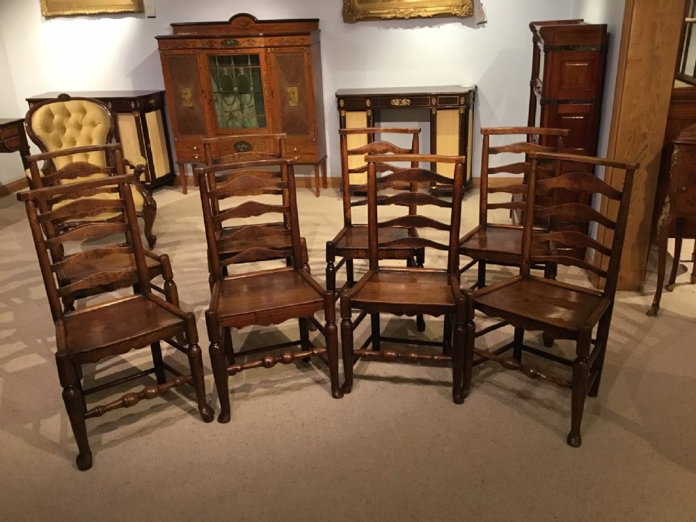 A harlequin set of 8 ash and elm Dales country dining chairs.