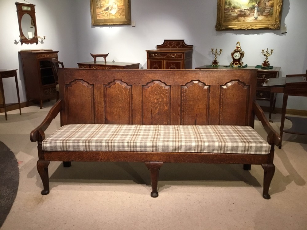 A lovely 18th Century oak original five panel settle