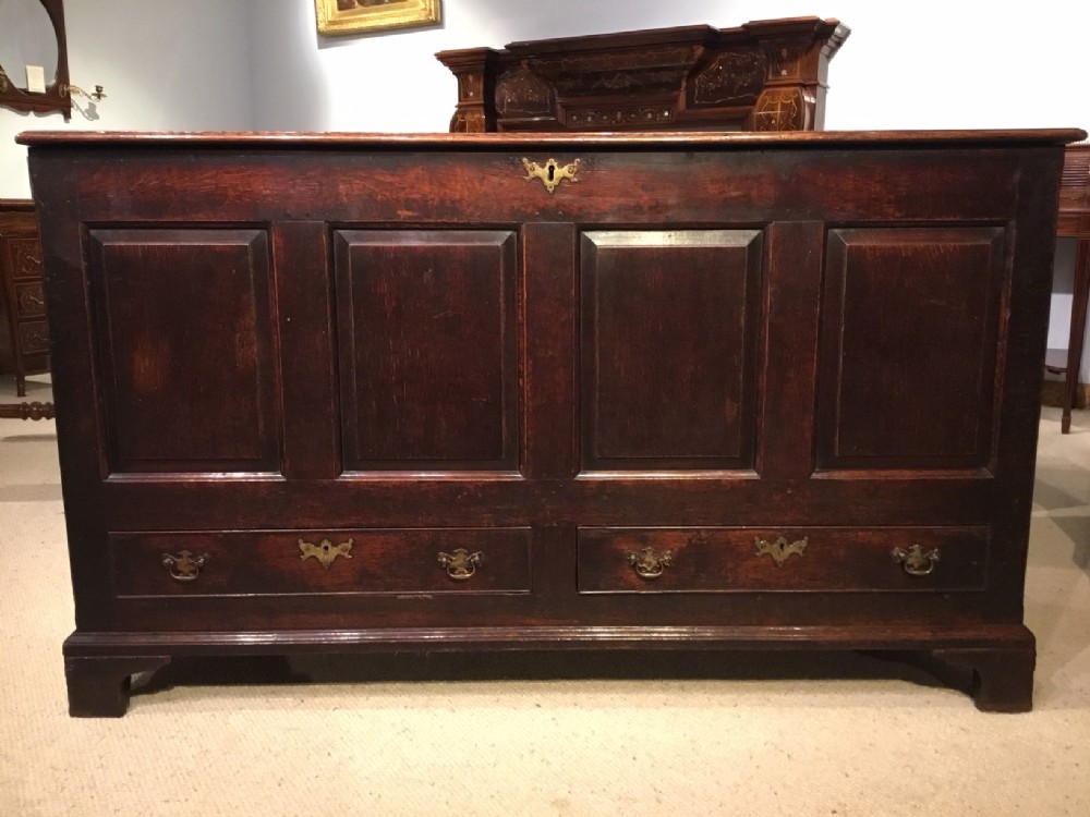 A good oak George III Period four panel mule chest.
