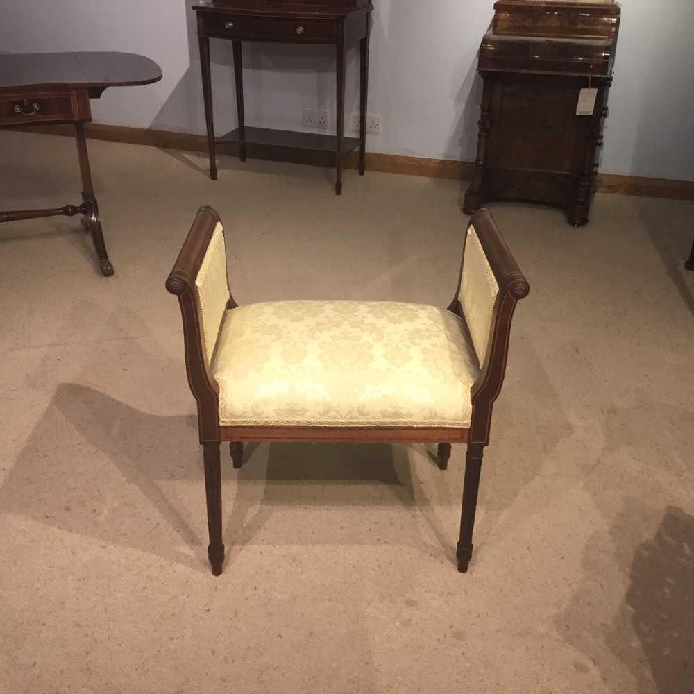An Edwardian Period mahogany inlaid stool