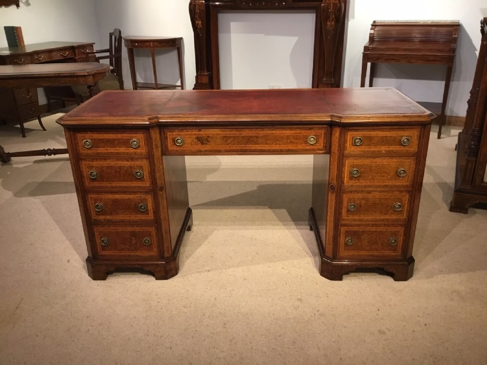 A burr walnut, kingwood & amboyna Victorian Period antique writing desk