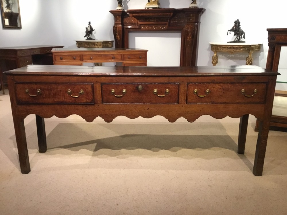 A lovely oak 18th Century three drawer dresser base