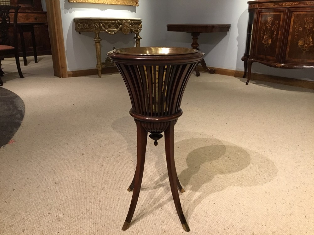 A Good mahogany Edwardian Period champagne stand by Shapland & Petter Of Barnstaple