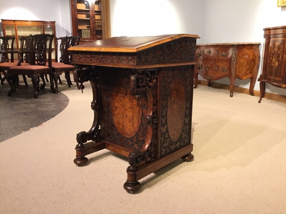 A fantastic quality burr walnut Victorian Period carved antique davenport