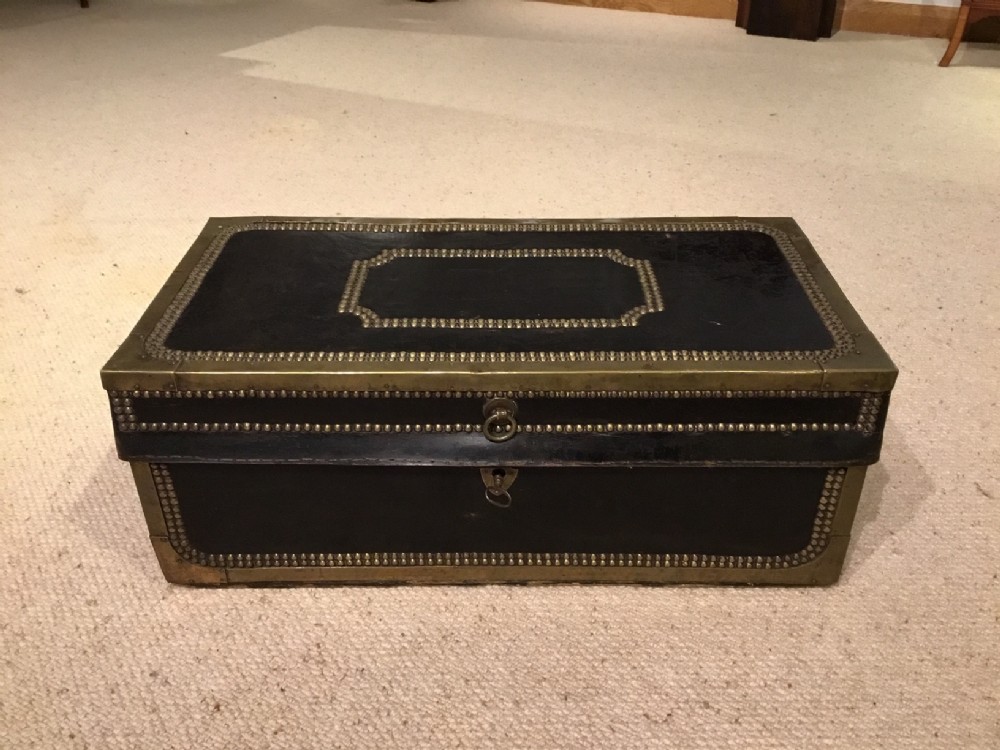 A 19th Century Leather & Brass Studded camphor lined trunk