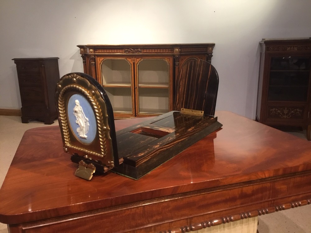 A Victorian Period corromandel and brass book-slide