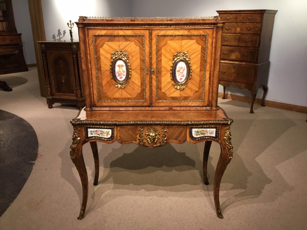 A French Victorian Period  kingwood, ormolu and plaque mounted bonheur de jour