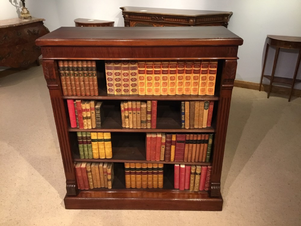 A walnut Victorian Period open bookcase