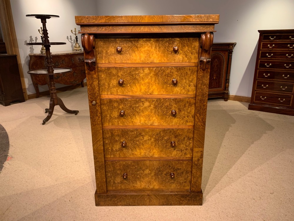 A Fine quality burr walnut Victorian Period wellington chest.