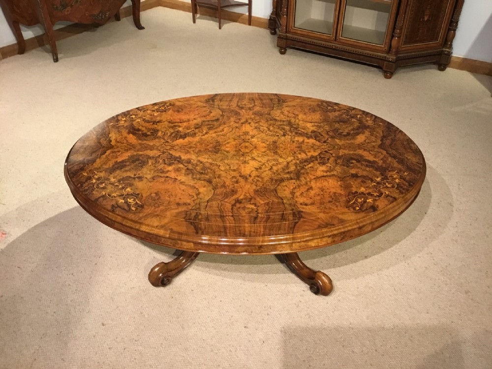 A Lovely burr walnut marquetry inlaid  Victorian Period oval coffee table