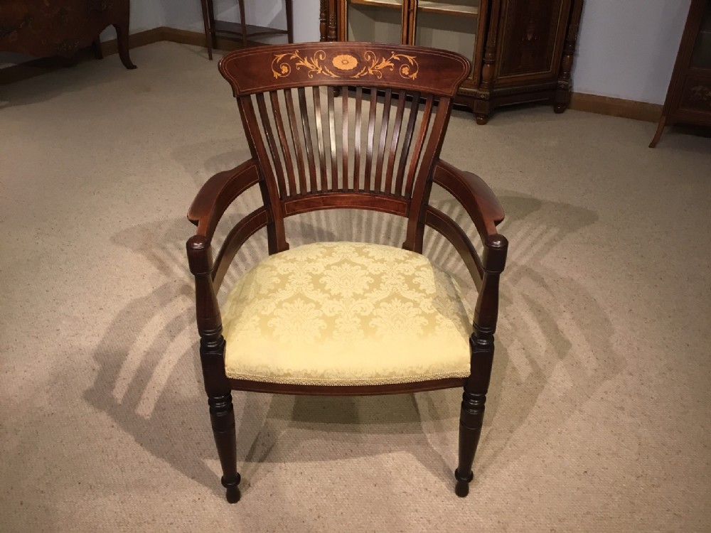 A mahogany inlaid Edwardian Period desk chair