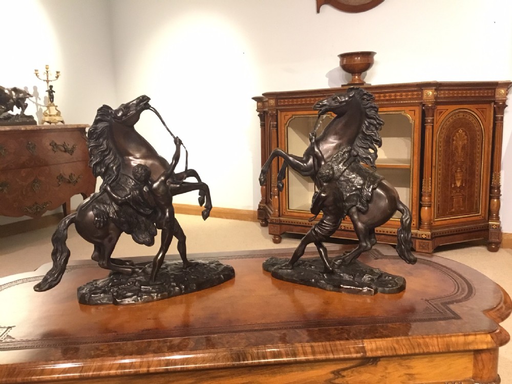A pair of French Classical 19th Century bronze Marley horses