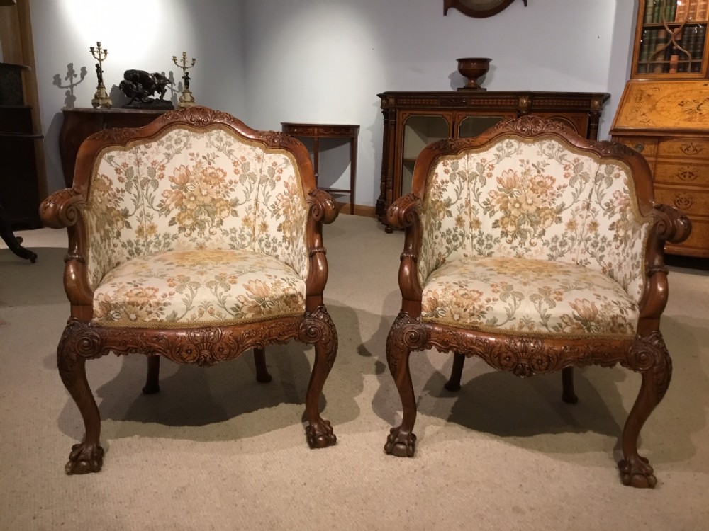 A Fine Quality Pair Of walnut Carved Armchairs.