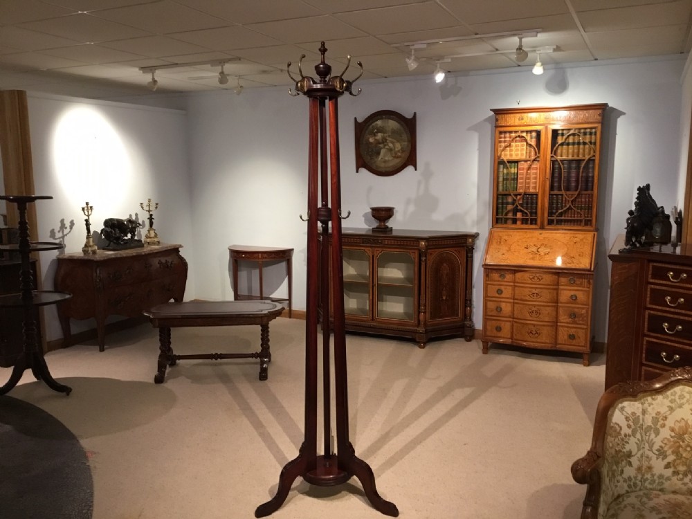 A mahogany Edwardian Period revolving hat and coat stand