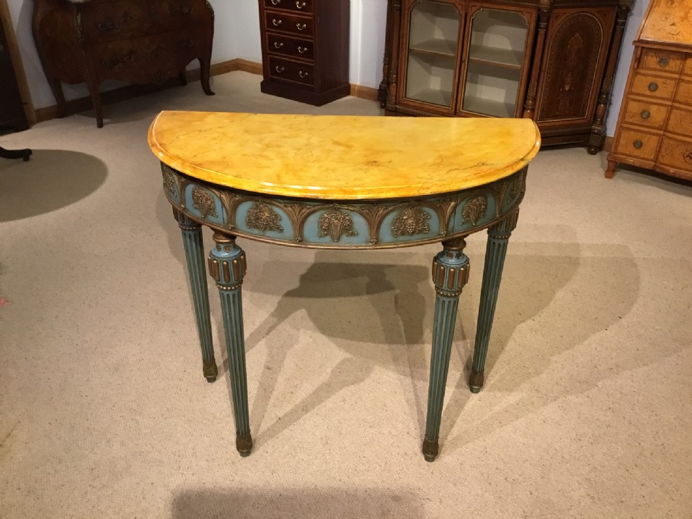  A continental painted gilt gesso console table