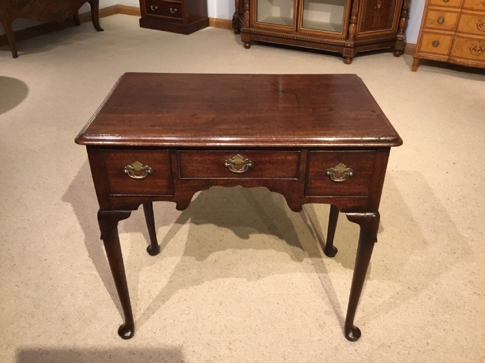  A George II Period mahogany lowboy