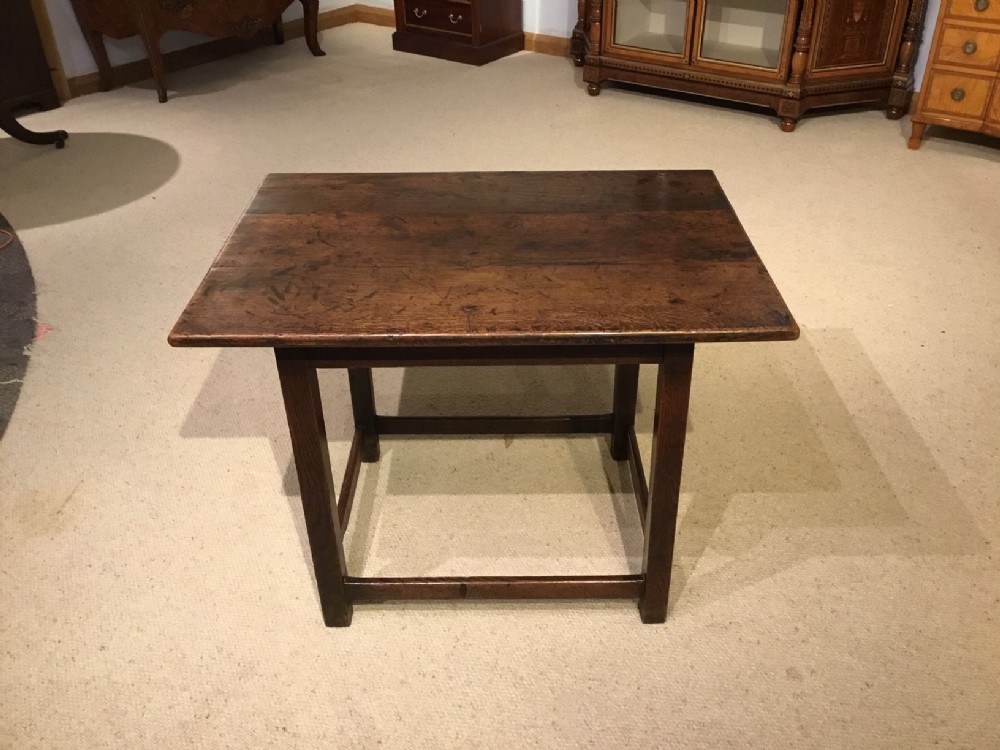 An oak Early 18th Century side table of fantastic colour and patination