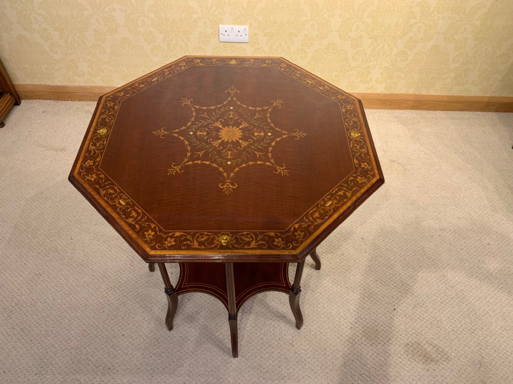 A Fine Quality Edwardian Period Octagonal Marquetry inlaid table by Edwards & Roberts of London.
