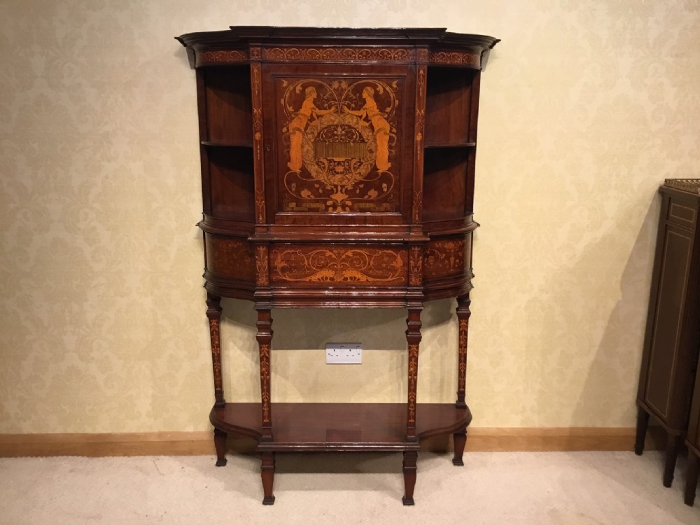  An Art Nouveau Period marquetry inlaid cabinet