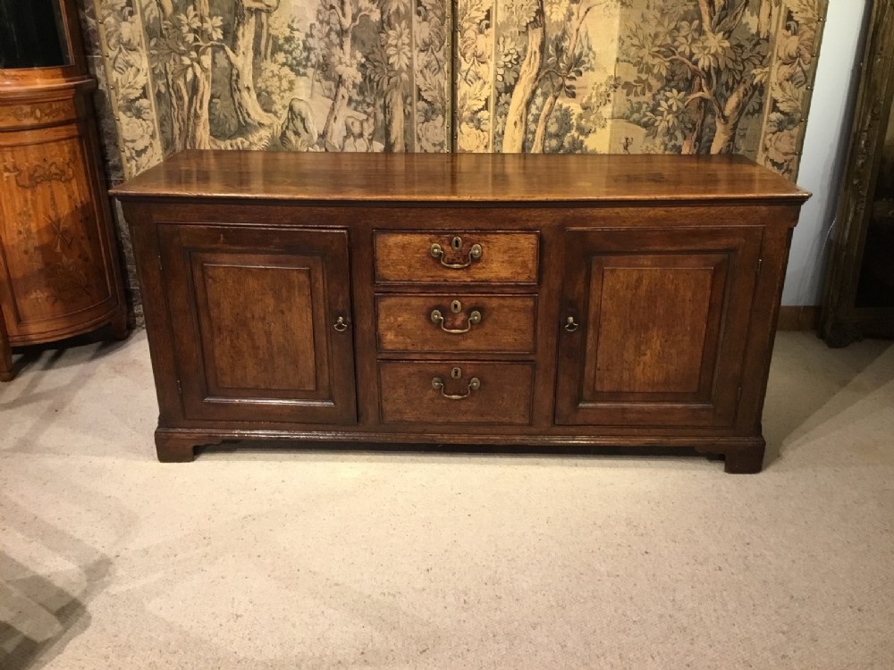 An oak George III Period Westmorland antique dresser base