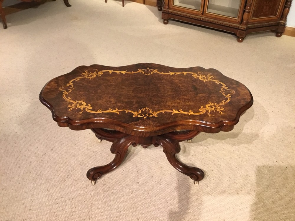 A beautiful burr walnut Victorian shaped coffee table