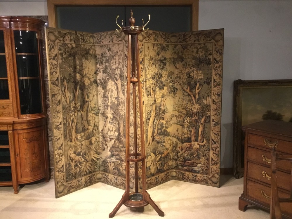 An Edwardian Period oak and brass hat and coat stand.