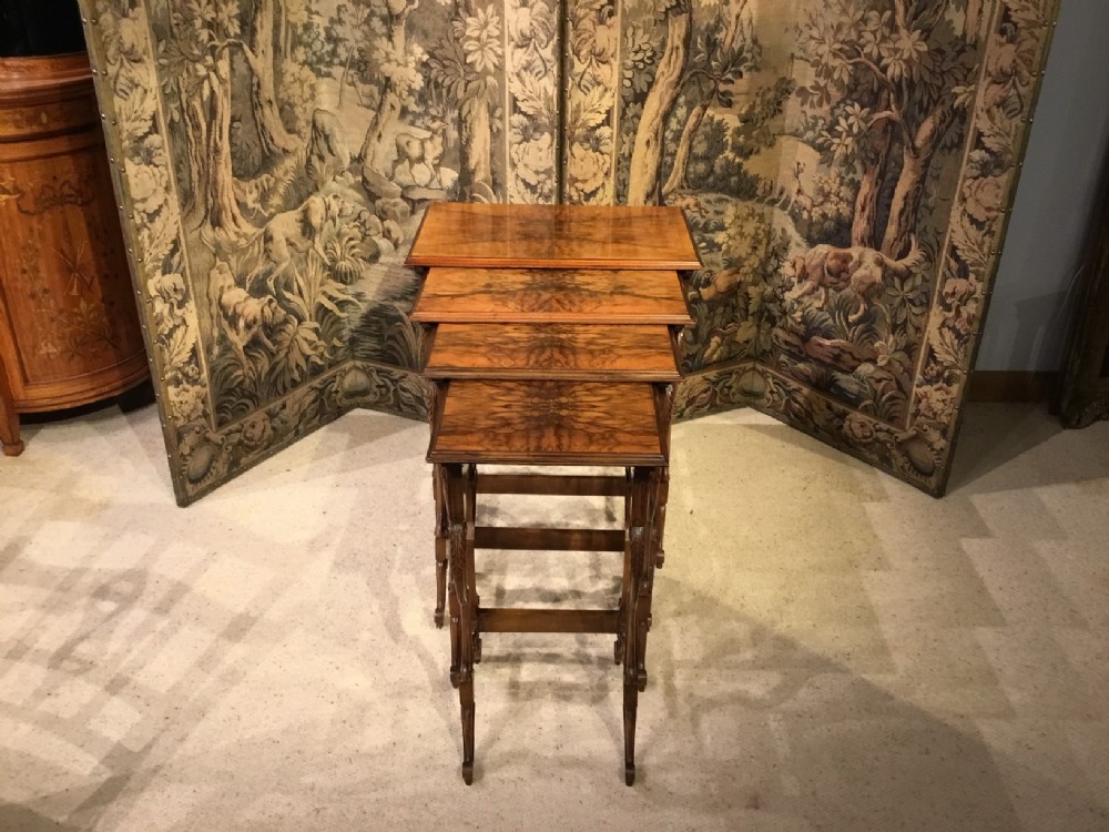 A Fine quality walnut quartetto of tables