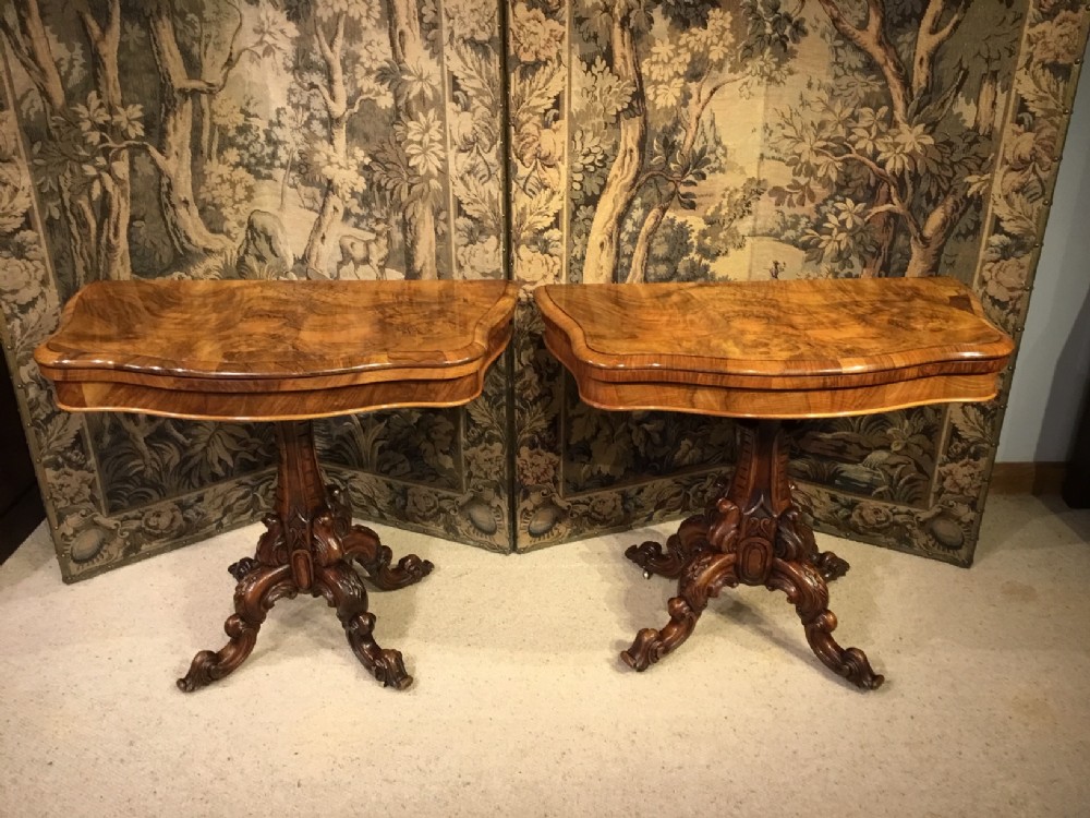 A lovely pair of burr walnut card tables by Lamb of Manchester