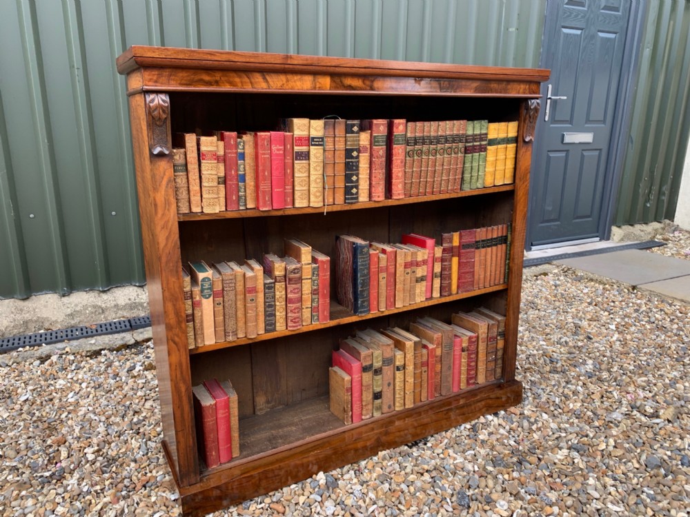 A fine quality Victorian Period figured walnut open bookcase