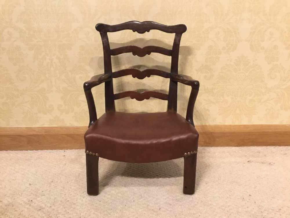 A George III Period mahogany child's armchair