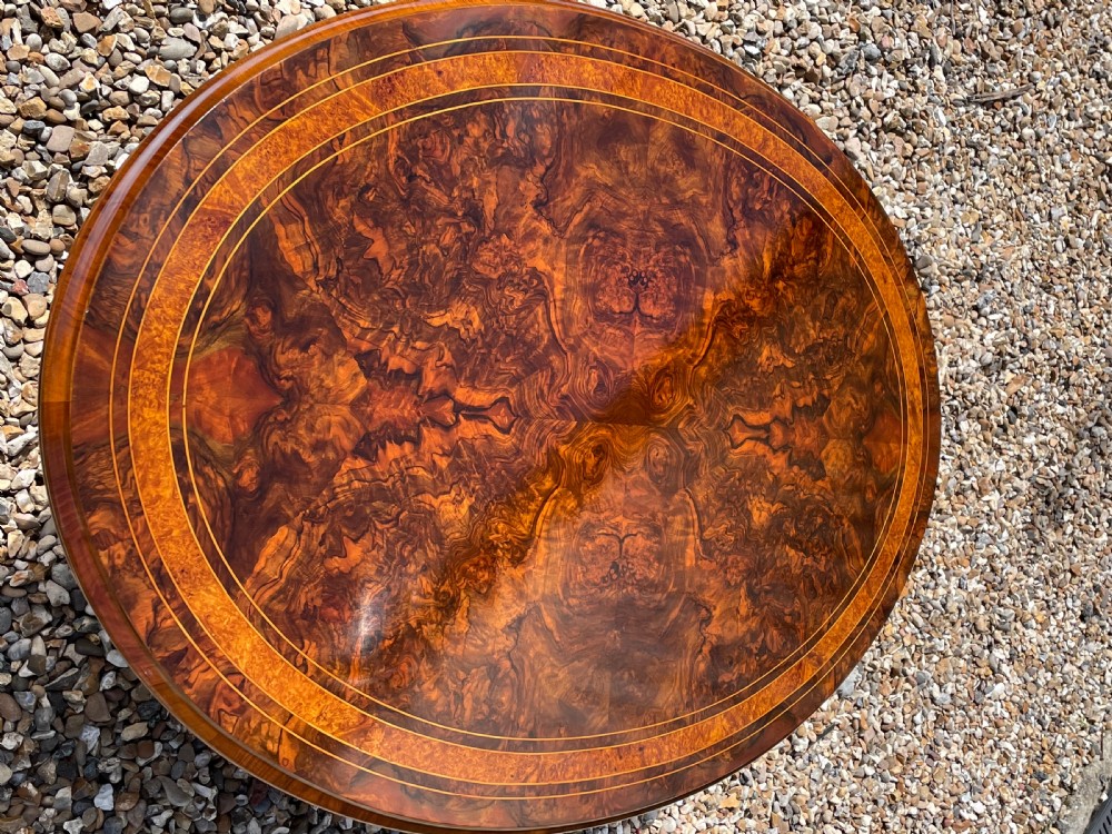 A Victorian Period oval burr walnut antique coffee table View IV