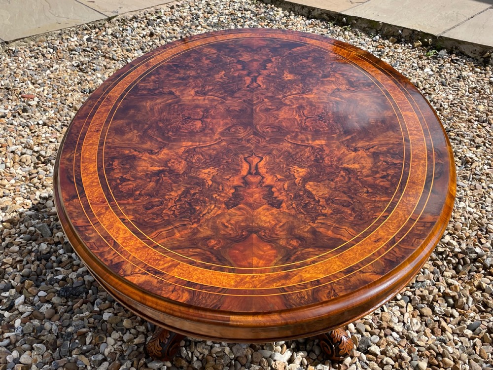 A Victorian Period oval burr walnut antique coffee table View IX