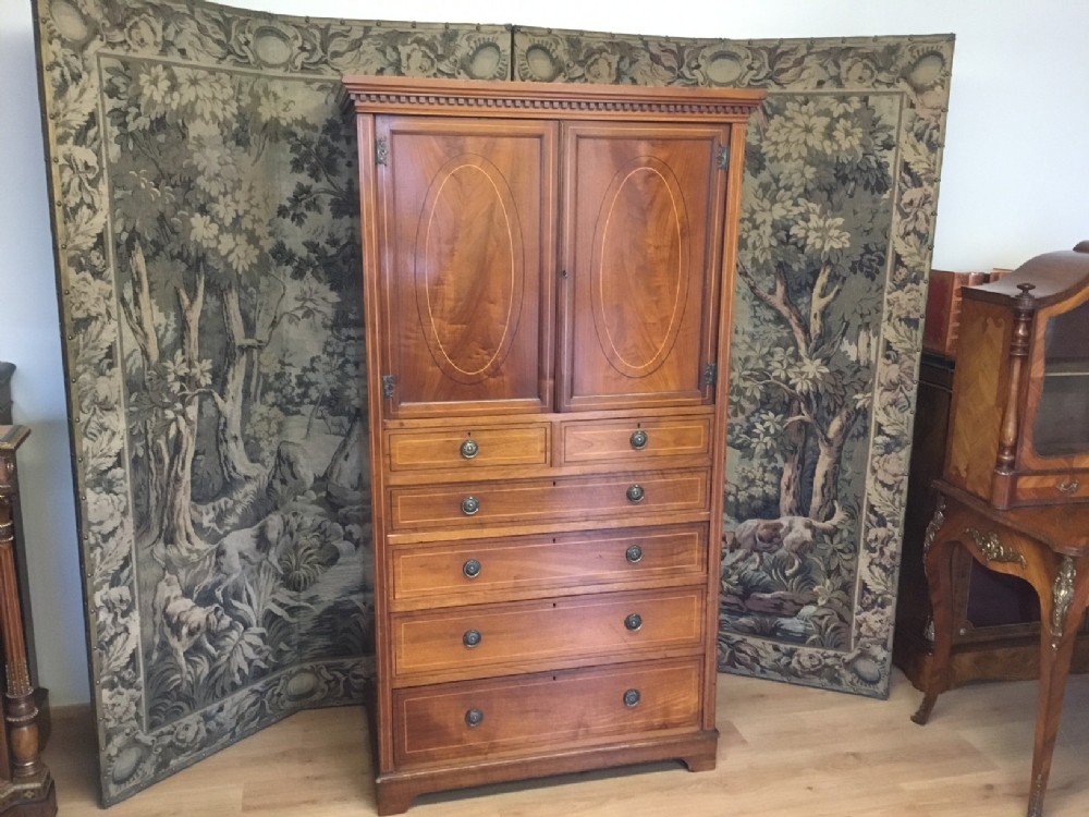 A fine quality walnut Victorian Period linen press of neat proportions