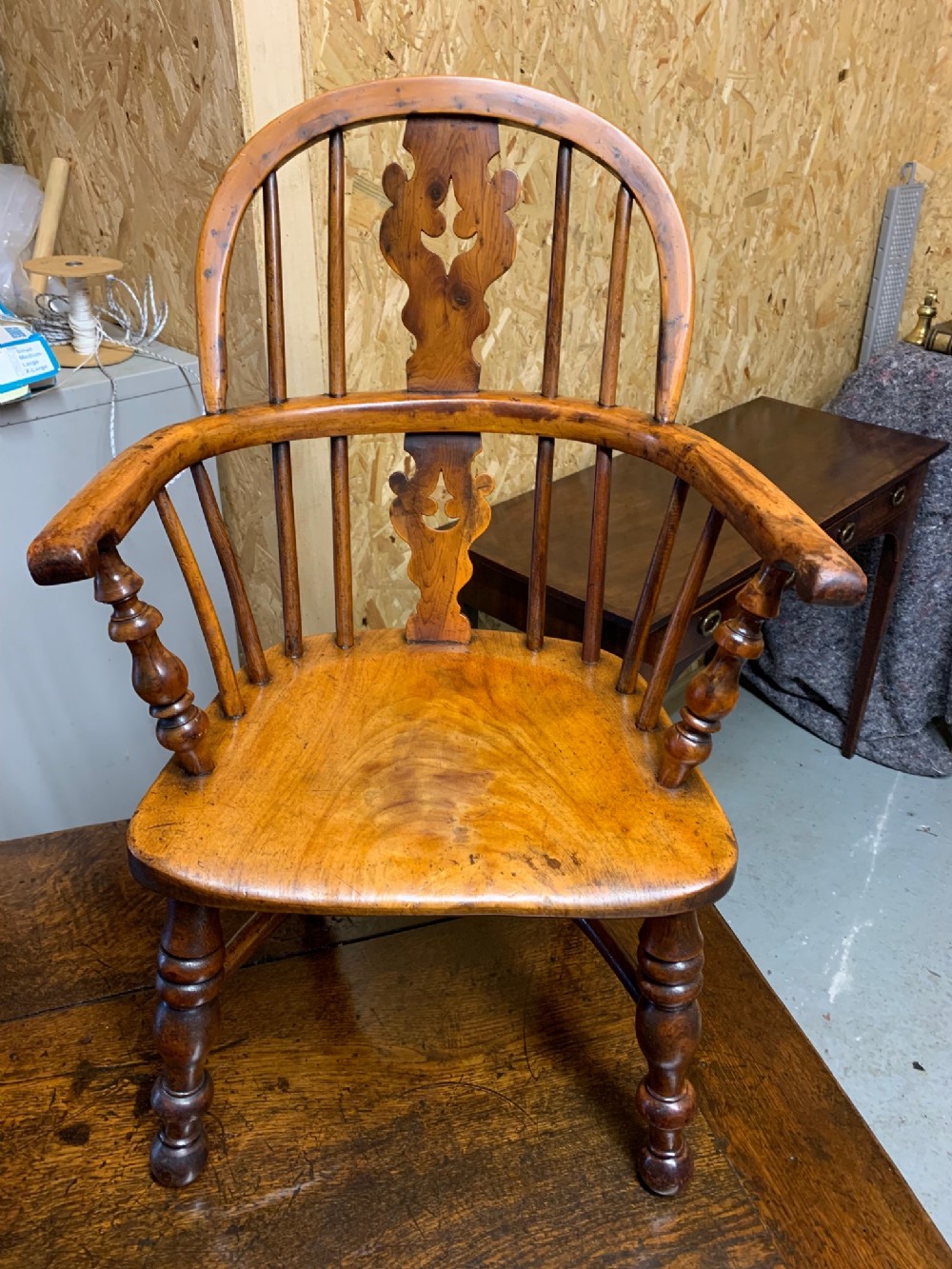 A wonderful 19th Century Childs yew wood Windsor armchair