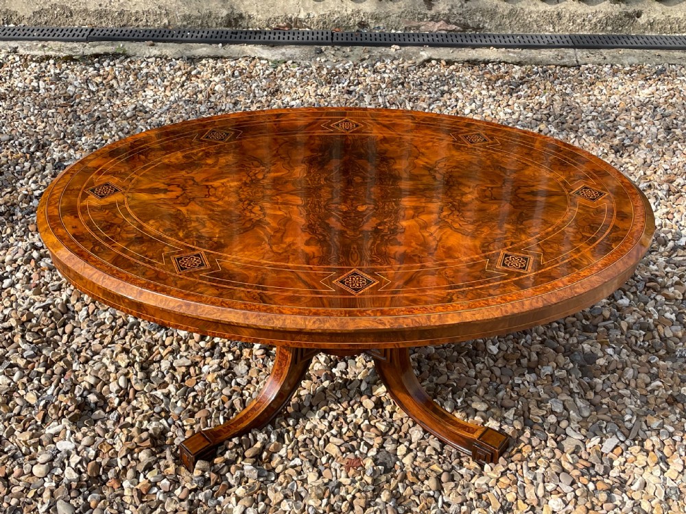 A Victorian Period oval burr walnut antique coffee table View XVI