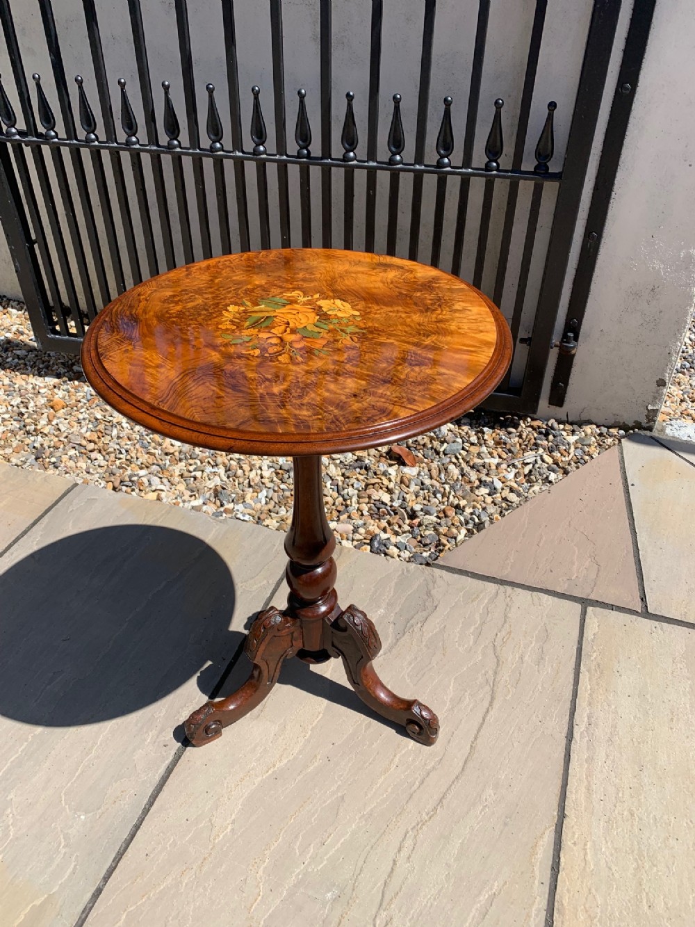 A Victorian Period burr walnut circular wine table