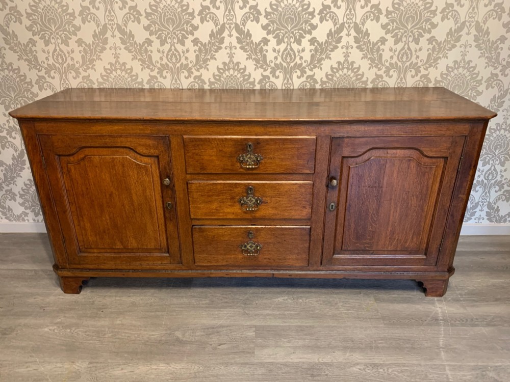 A George III Period antique oak Westmorland dresser base