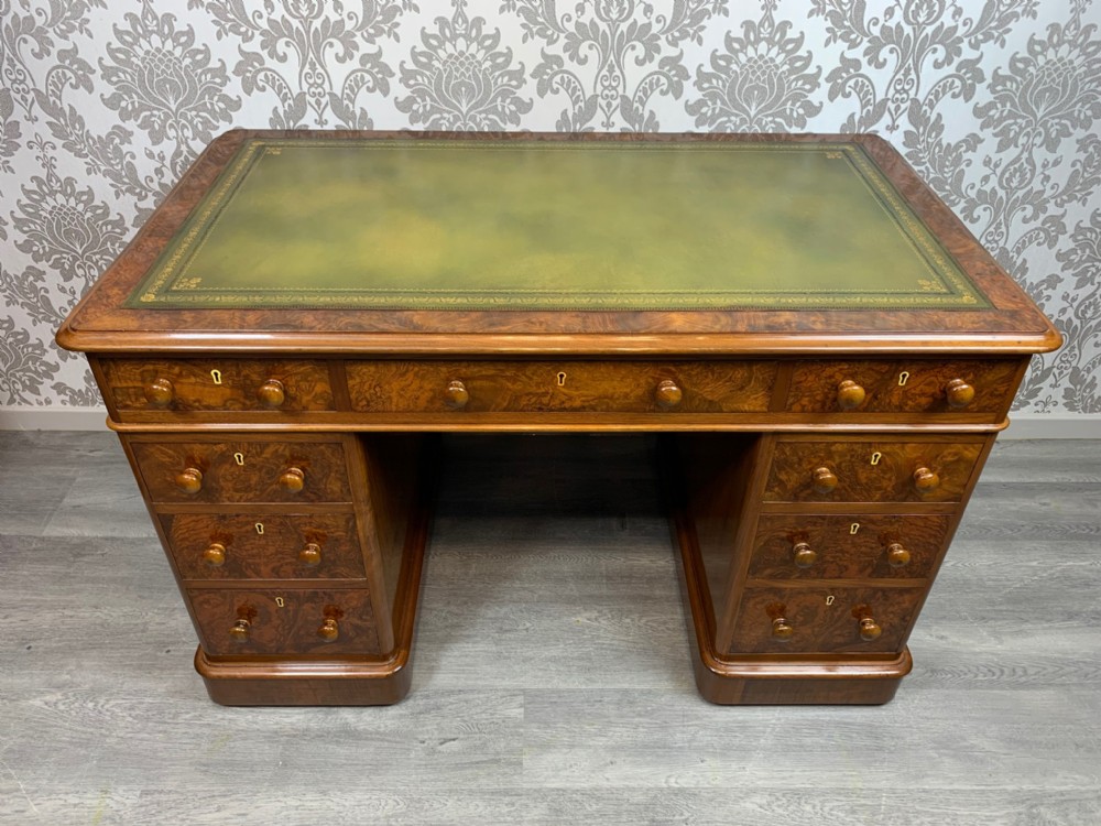 A superb quality Victorian Period burr walnut antique pedestal desk.