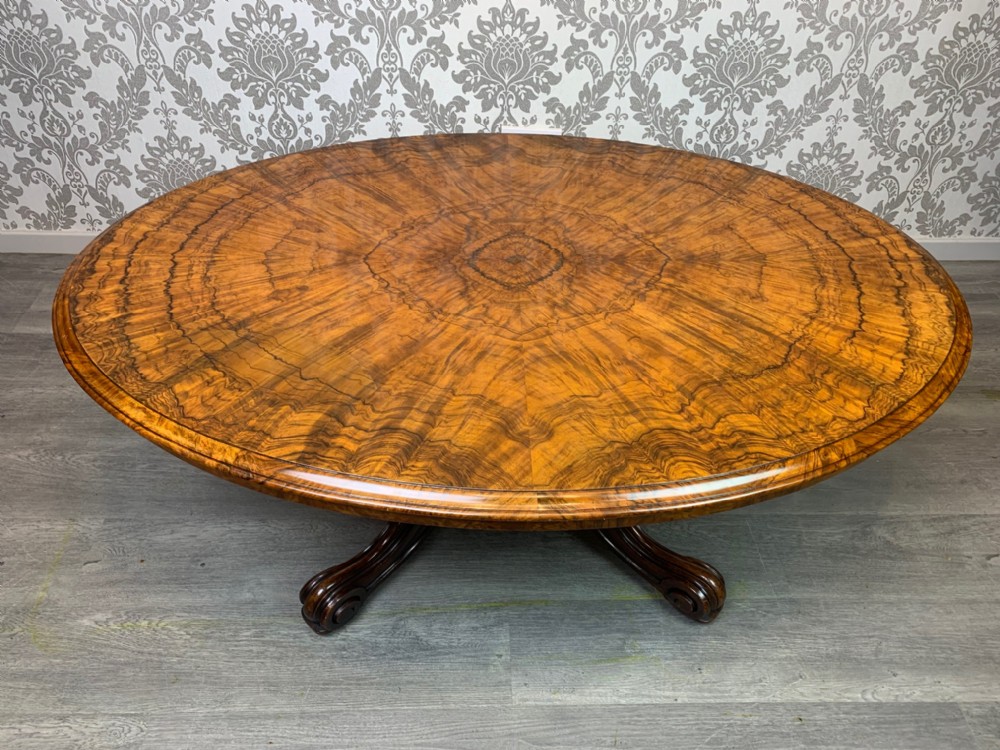A beautiful Victorian Period oval burr walnut antique coffee table