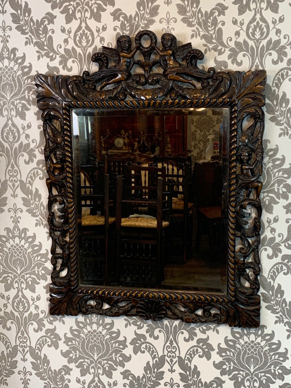 A William & Mary Style carved walnut mirror