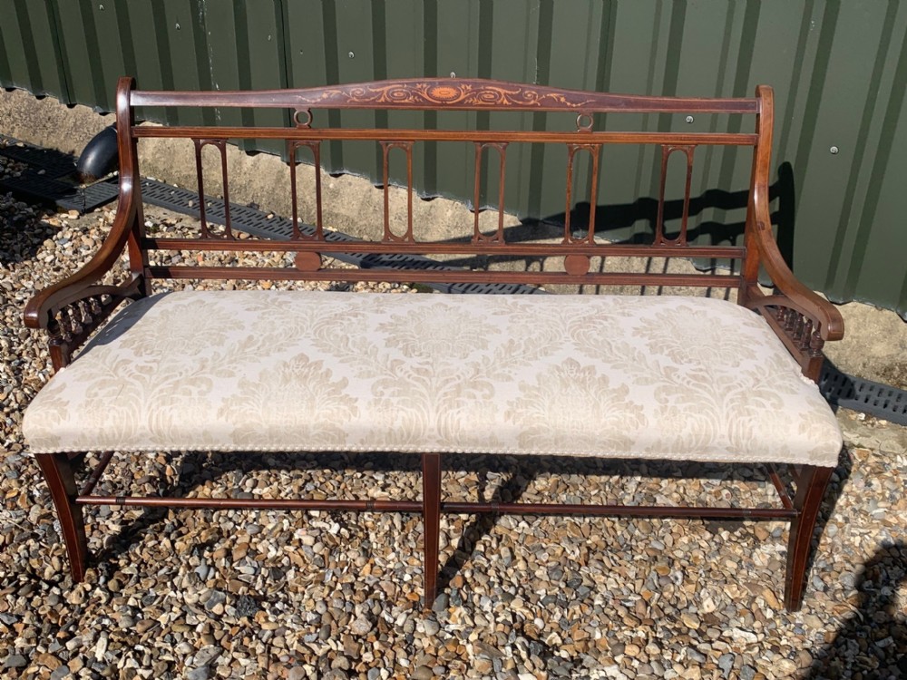 An Edwardian Period mahogany inlaid settee 