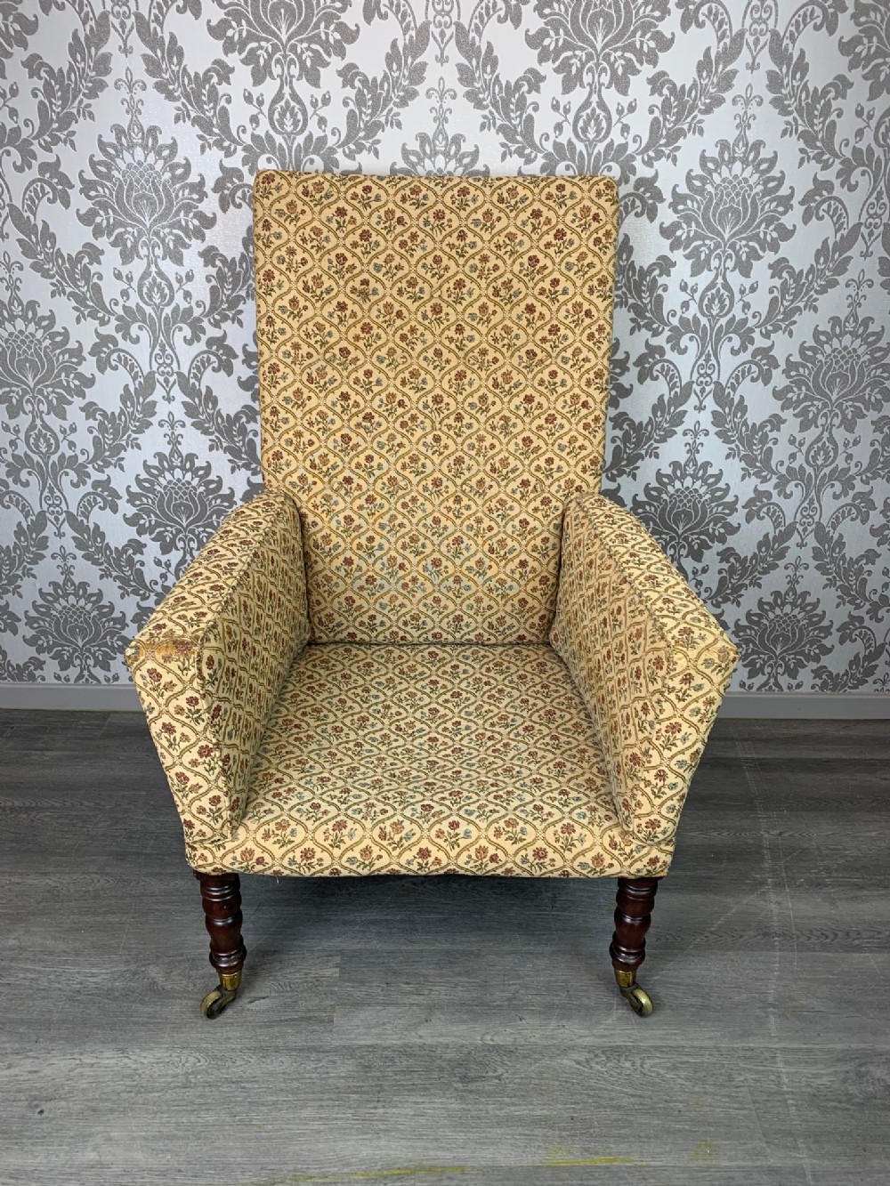 An Early 19th Century upholstery armchair